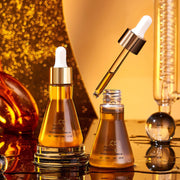 Polypeptide Facial serum bottles with droppers against a glamorous golden background, showcasing skincare benefits.